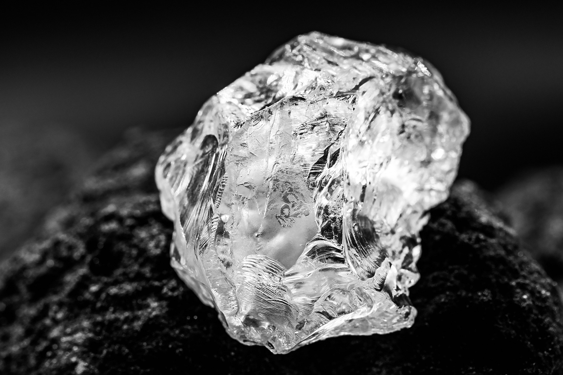 Rough diamond, precious stone in mines. Concept of mining and extraction of rare ores.